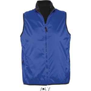 A blue reversible vest with a black interior, waterproof and windproof, featuring side pockets and a zip closure.