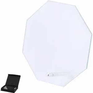 An octagonal glass mirror with a black box for storage. The mirror has a sleek, clear design.