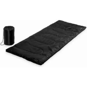 A black sleeping bag laid out beside a compact, rolled-up version in a storage bag.