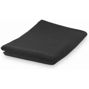 A folded black fabric square, neatly arranged and smooth, featuring a simple design and no visible logos.