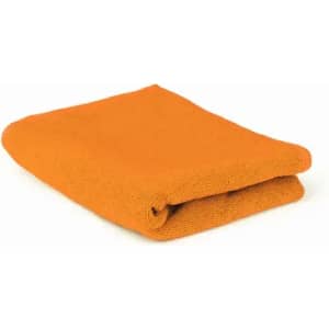 An orange towel, neatly folded, displaying a soft texture and vibrant colour. It has no visible logos or branding.