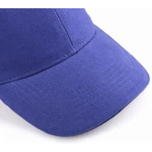 A cap in vibrant blue, featuring a curved brim and detailed stitching. The material has a textured finish.