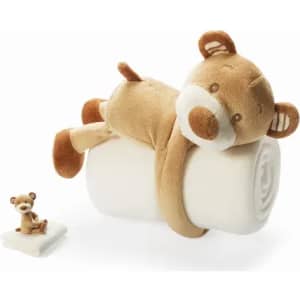 A plush teddy bear wrapped around a white roll blanket, with a smaller teddy bear beside it.