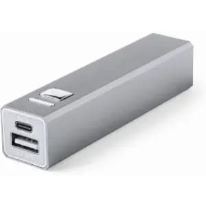 A portable charger in silver, featuring USB and USB-C ports. The design is sleek and rectangular.
