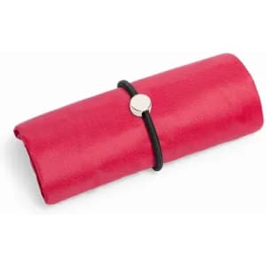A red folded product with a black strap and a silver fastening. It has a textured surface and is compact in shape.