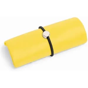 A yellow rolled-up product secured with a black elastic band, featuring a silver accent.