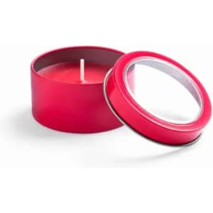 A red candle in a round tin with a clear lid. The lid is partially open, revealing the candle inside.