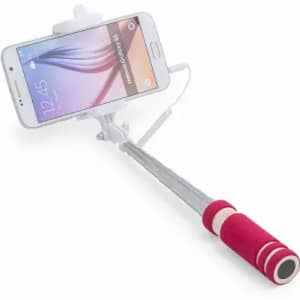 A pink and silver selfie stick holding a smartphone, featuring a textured grip and a spring-loaded holder.