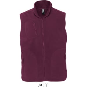 A unisex fleece vest in a rich burgundy colour, featuring a full zip and multiple pockets. Includes a logo.