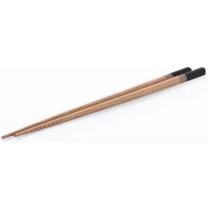 Two wooden chopsticks with black tips laid horizontally on a white background.