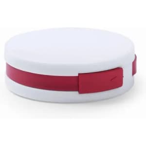 A round, white storage container features a red strap around its middle and has a branding logo.