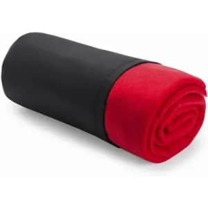 A rolled blanket in red and black fabric, featuring a simple design with a sleek, modern look.