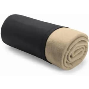 A rolled-up blanket in beige with a black cover. It features a simple design and is neatly compacted.