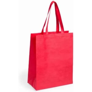 A red reusable shopping bag with two handles and a flat bottom, designed for carrying items.