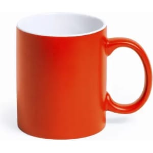 An orange mug with a white interior and a curved handle. It has a smooth, glossy finish.