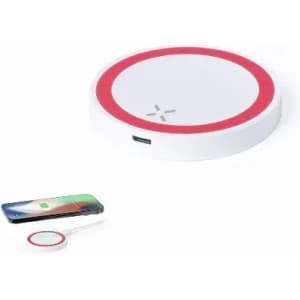 A wireless charger in white with a red ring, next to a smartphone displaying charging status.