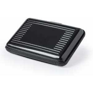 A sleek black cardholder with a smooth surface and ribbed design on the lid. It features a secure clasp.