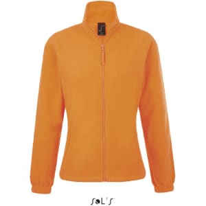 A women's zippered fleece top in bright orange, featuring a high collar and elastic cuffs. It has a branding logo.
