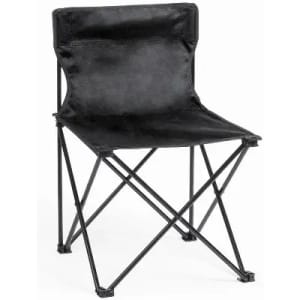 A portable folding chair with a black fabric seat and a black metal frame, designed for easy transport and storage.