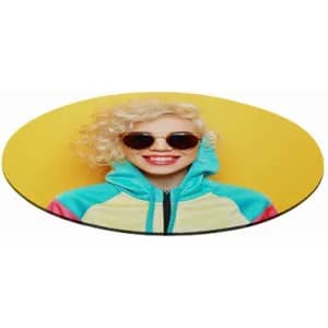 A round mouse pad featuring a smiling woman with curly blonde hair, wearing sunglasses and a colourful hoodie against a yellow background.