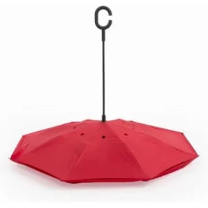 A red umbrella with a black C-shaped handle and a canopy featuring multiple sections. It has a logo on the handle.