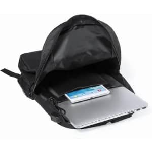 A black backpack with an open top, revealing a laptop and a tablet inside. It features multiple compartments.