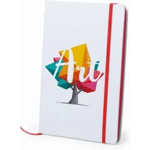 A notebook with a colourful tree graphic on the cover, featuring a red elastic band.