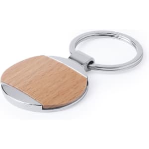 A keyring featuring a polished metal finish and a wooden insert, offering a sleek, modern design.