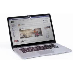 A laptop with a visible webcam cover on the screen, displayed against a plain background.