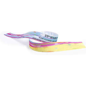 A decorative ribbon featuring a colourful gradient of pink, blue, and yellow with printed text and a logo.
