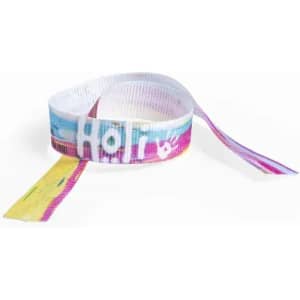 A patterned ribbon in vibrant colours including pink, yellow, and blue, featuring a logo or branding.
