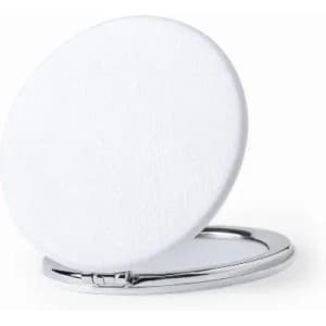 A compact mirror with a circular white surface and a shiny silver casing.