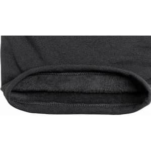 A close-up view of the hem of a black garment, featuring a soft, lined interior.