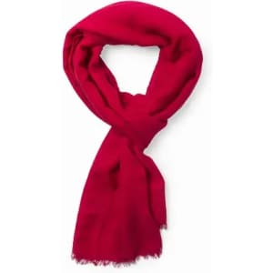 A scarf in bright pink, featuring a soft fabric and fringed edges, arranged in a loop.