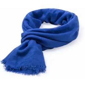 A blue scarf with frayed edges, neatly arranged in a loop. It features a soft, textured fabric and has no visible branding.