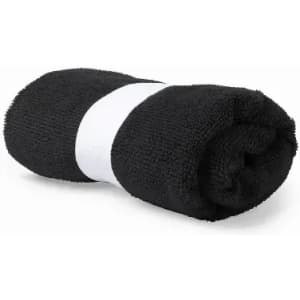 A rolled black towel with a white band around the middle, showcasing a textured fabric.