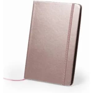 A notebook in a smooth rose gold finish, featuring a pink ribbon bookmark and an elastic band closure.