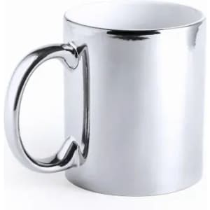 A drink bottle with a shiny silver finish and a distinctive handle design. It features a metallic look.