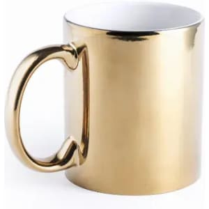 A gold coffee mug with a unique handle design, featuring a shiny finish and a white interior.