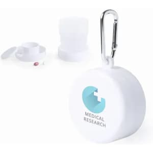 A white pill holder with a carabiner and a removable lid, featuring a logo design.