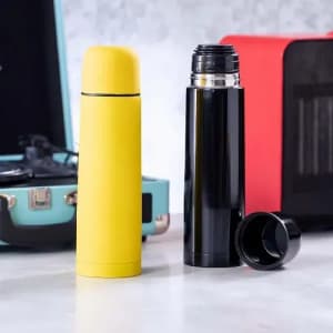 A drink bottle in yellow and a black thermos with an attached lid, featuring a logo on one bottle.