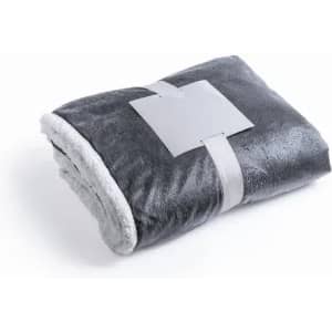 A grey plush blanket folded neatly with a white band wrapped around it.