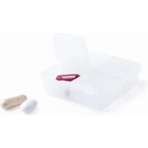 A pill organiser with four compartments, featuring three capsules in various colours: white, beige, and red.