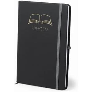 A black notebook with a grey elastic band and a logo featuring an open book on the cover.
