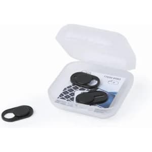 A set of black webcam covers in a clear case, with additional covers beside it.