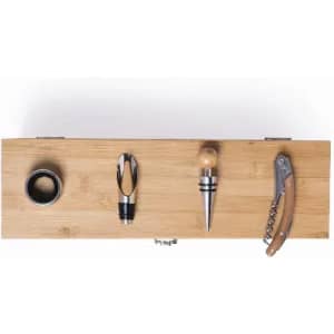 A wooden box containing four wine accessories, including a corkscrew, pourer, stopper, and collar.
