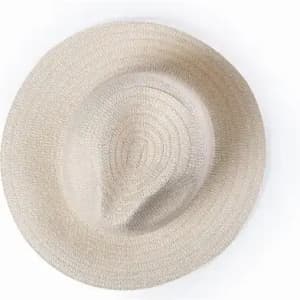 A straw hat in a light beige colour with a round, flat crown and wide brim. It has a textured, woven design.