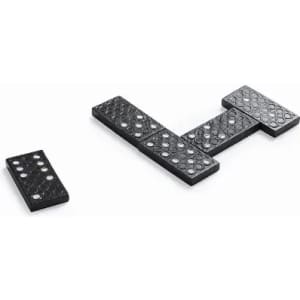 A set of black dominoes featuring circular dots, arranged in a partial layout with one piece separate.