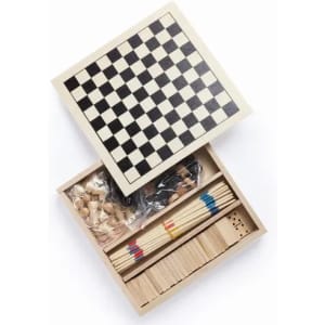 A wooden game box with a black and white chessboard on top, containing game pieces and sticks inside.