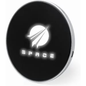 A wireless charger featuring a black circular design with a silver edge and a light-up logo.